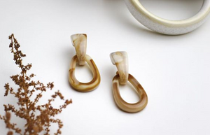Weathered Penny resin Mia earrings in marbled neutral tones. Handmade in the UK for Modern Craft.