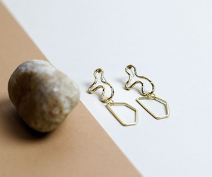Weathered Penny Luna 18k gold plated earrings in irregular shapes. Handmade in the UK for Modern Craft.