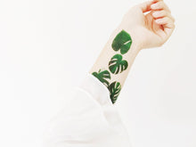 Load image into Gallery viewer, Sophie Clowders botanical monstera palm leaf temporary tattoo for Modern Craft